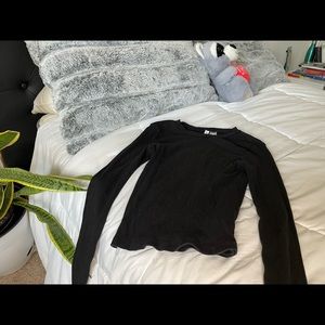 Black long sleeve, short turtle neck.